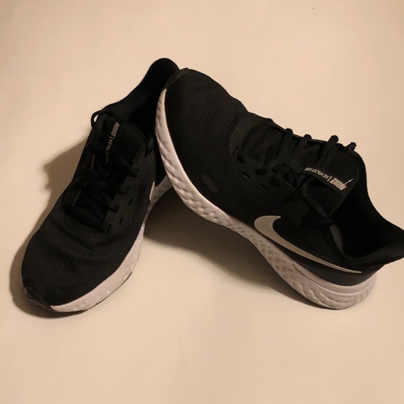 Nike Shoes - Nike Women's Black and White Sneakers. In good condition